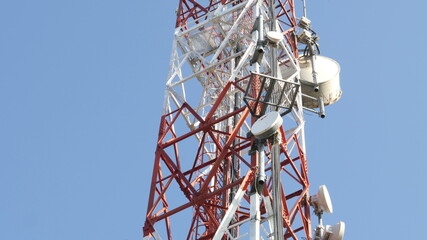 Telecommunication Cellular Tower Against Blue Sky