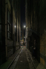 A narrow alley at night