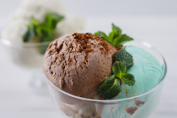 Ice-cream. Flavored sundae variety in glass bowls, refreshing dessert for summertime.