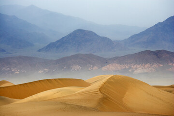 Fototapeta na wymiar USA, California, Death Valley National Park. Sand dunes on stormy day.