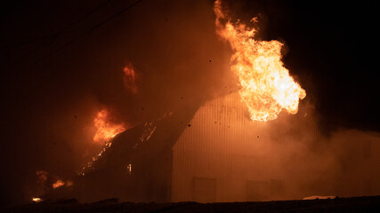 Blazing fire barn.