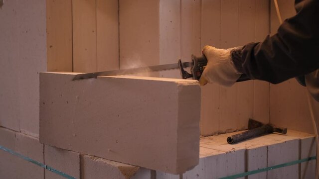 electric saw cutting bricks, electric saw cutting bricks