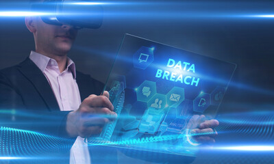 Business, Technology, Internet and network concept. Young businessman working on a virtual screen of the future and sees the inscription: Data breach