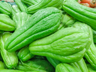 vegetable known as chayote, on a stall at an open market in Rio de Janeiro .