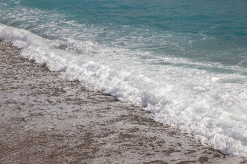 angry waves and waterfalls in the blue sea  