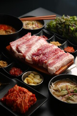 Thick Korean-style raw pork belly dish 두툼한 한국식 생삼겹살 요리