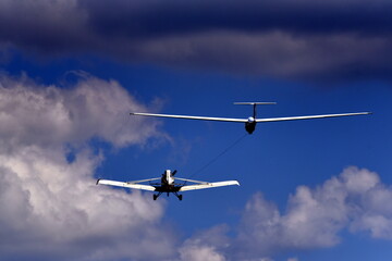 Fototapeta na wymiar Plane towing sailplane glider airborne