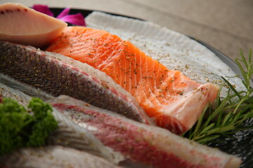 Seasoned seafood with fresh octopus, salmon, tuna and flatfish in one plate. 싱싱한 문어,...