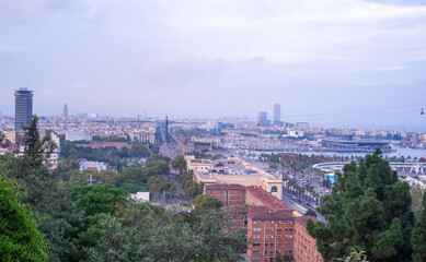Obraz premium View of Barcelona from the observation deck on a warm summer evening.