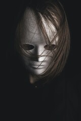 girl wearing a mask