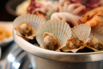 Steamed seafood dish with steaming and fresh seafood 김이 모락모락 나고신선한 해산물이 들어가 있는 해산물찜 요리