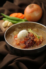 Korean traditional food naengmyeon with thin ice 살얼음이 있는 한국 전통 음식 냉면