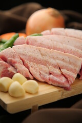 Grilled thick raw pork belly, a Korean barbecue dish 한국 바베큐 요리인 두툼한 생 삼겹살 구이