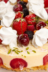 Cheesecake with fruits and berries on top