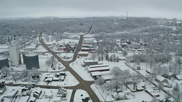 Industrial side of small county town in aerial view, winter season