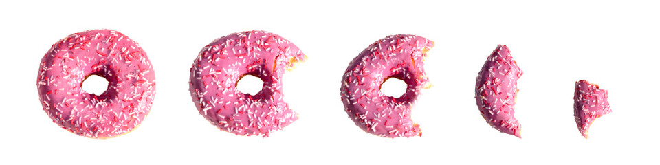 donuts disappear with bites. eating a donut. horizontal photo of pink donuts