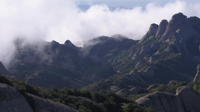 Montserrat Mountain Range Surrounded by Clouds, Near Barcelona, Catalonia, Spain, Aerial