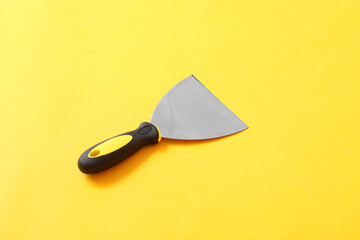 New spatula on color background