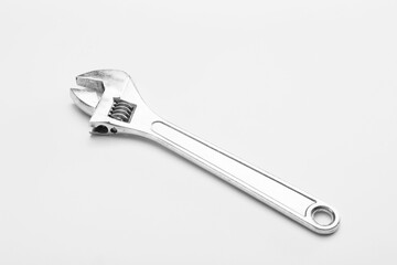 Adjustable wrench on white background