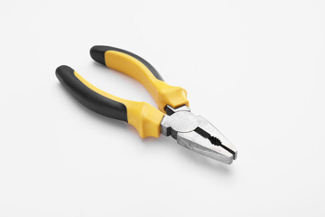 New pliers on white background