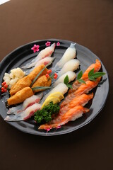 a plate of colorful assorted sushi 형형색색의 다양한 모듬 초밥 한 접시