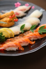 a plate of colorful assorted sushi 형형색색의 다양한 모듬 초밥 한 접시