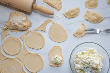 pierogi ruskie, Baked dumplings stuffed with curd cheese and potatoes 