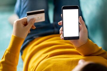 Woman make purchase easy and comfort order using smartphone at home