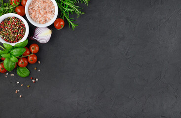 Colorful various herbs and spices for cooking on dark background, copy space, mock up, banner