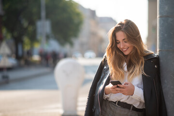 Young woman busy in using social media applications