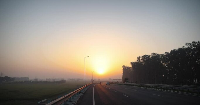 the sun is rising along with national highways in Punjab, India