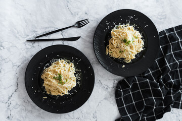 plates with paste and cheese
