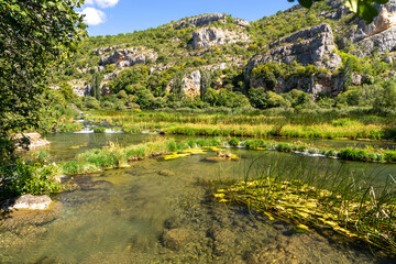 Fototapeta na wymiar Krka national park, famous travel destination in Dalmatia of Croatia. Krka waterfalls in the Krka National Park in autumn, Croatia
