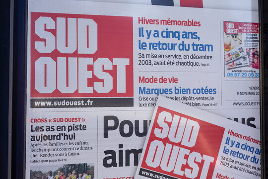 Sud Ouest French newspaper third largest regional daily paper in france with logo and sign text on advertising