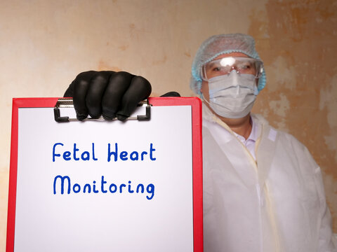  Fetal Heart Monitoring Sign On The Piece Of Paper.