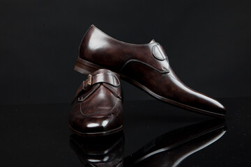 Man's shoes on black background