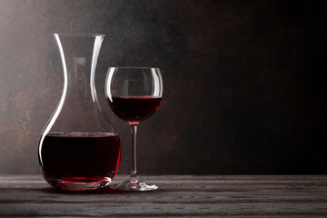 Wine decanter and glass of red wine