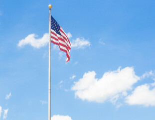 american flag against sky