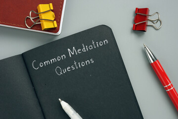  Common Mediation Questions phrase on the piece of paper.