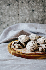 a plate of cakes, only from the oven, sprinkled with powdered sugar