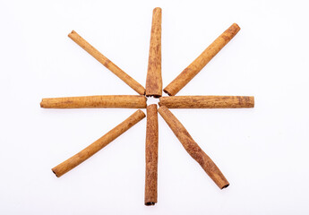 Cinnamon sticks, classic spice from the inner bark of tropical Asian trees, flavorful and aromatic for cooking, baking, health food and medicinal uses.