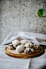 a plate of cakes, only from the oven, sprinkled with powdered sugar