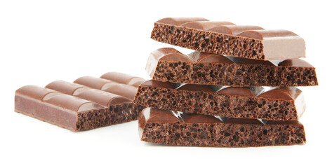 Stack of brown porous chocolate isolated on white background