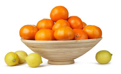 Tropical fruits in the woven basket isolated. Ьandarins, lemons. For design of interiors