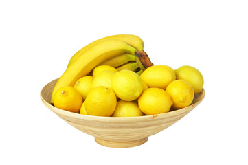 Tropical fruits in the woven basket isolated. Banana lemon. For design of interiors