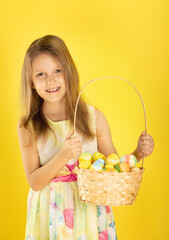 girl with basket of Easter eggs