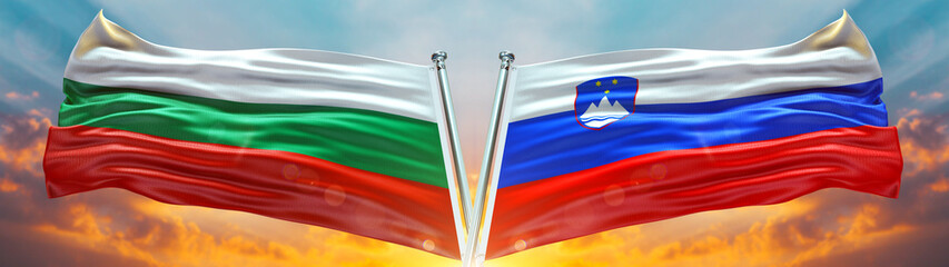 Bulgaria Flag and Slovenia Flag waving with texture Blue sky could and sunset Double flag