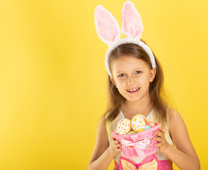 girl with basket of Easter eggs