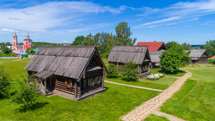 Fototapeta na wymiar Wooden huts in the Russian village