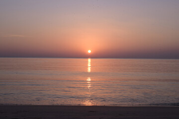 Naklejka premium sunset over the sea